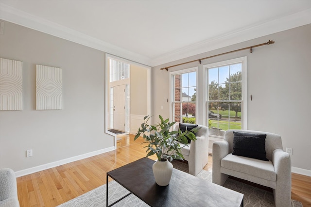45055 Walnut Rdg, Northville, MI 48168 - sitting room with ornamental molding, wood finished floors, and baseboards