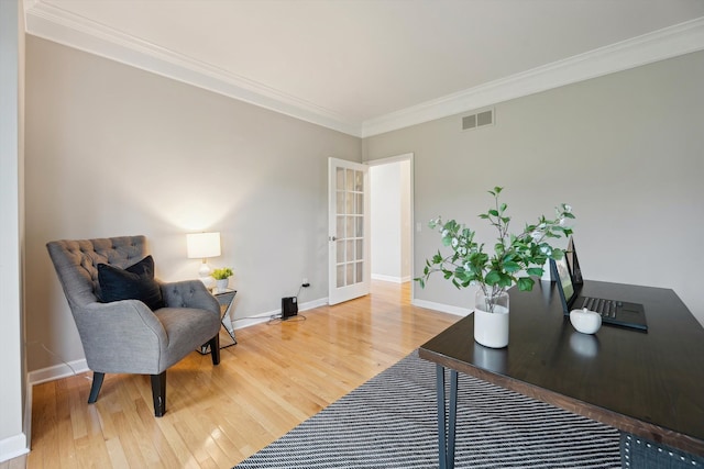 45055 Walnut Rdg, Northville, MI 48168 - office area with wood finished floors, baseboards, ornamental molding, and french doors