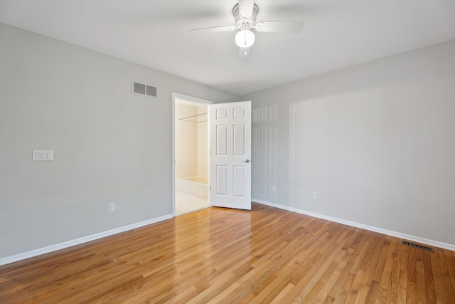 45055 Walnut Rdg, Northville, MI 48168 - empty room featuring a ceiling fan, baseboards, and light wood-type flooring