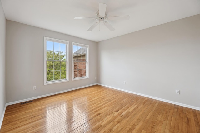 45055 Walnut Rdg, Northville, MI 48168 - spare room with light wood-type flooring, baseboards, and ceiling fan