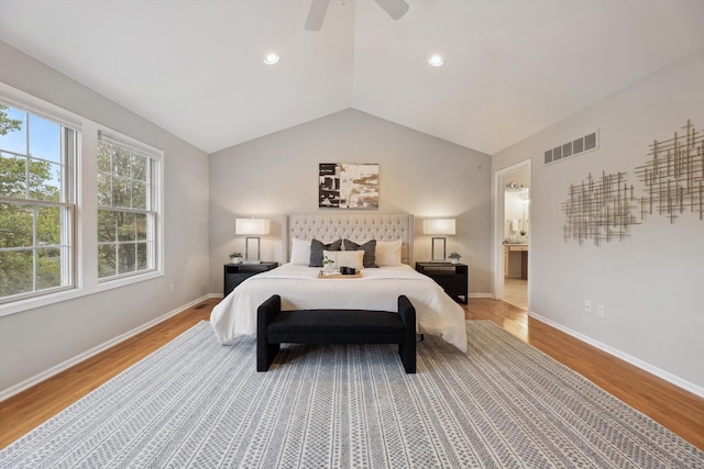 45055 Walnut Rdg, Northville, MI 48168 - bedroom with vaulted ceiling, wood finished floors, a ceiling fan, baseboards, and connected bathroom