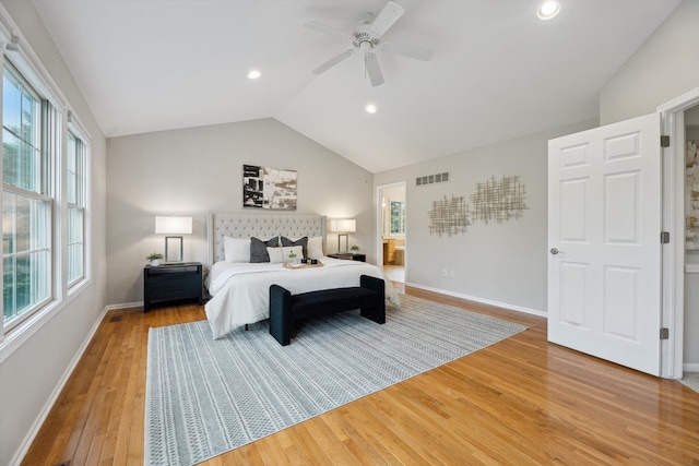 45055 Walnut Rdg, Northville, MI 48168 - bedroom with vaulted ceiling, light wood-style floors, multiple windows, baseboards, and a ceiling fan