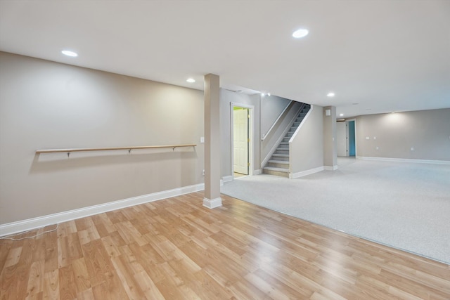 45055 Walnut Rdg, Northville, MI 48168 - finished below grade area featuring stairs, baseboards, recessed lighting, and light wood-style flooring