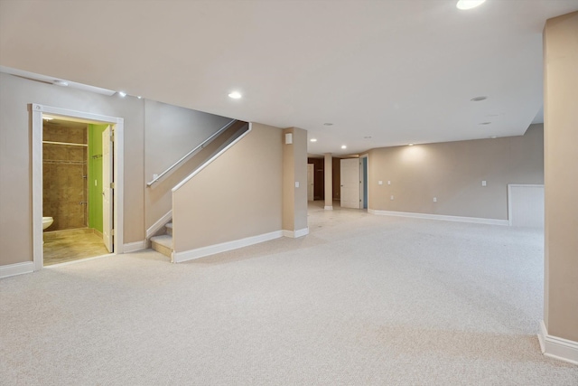 45055 Walnut Rdg, Northville, MI 48168 - finished basement featuring light colored carpet, stairway, recessed lighting, and baseboards