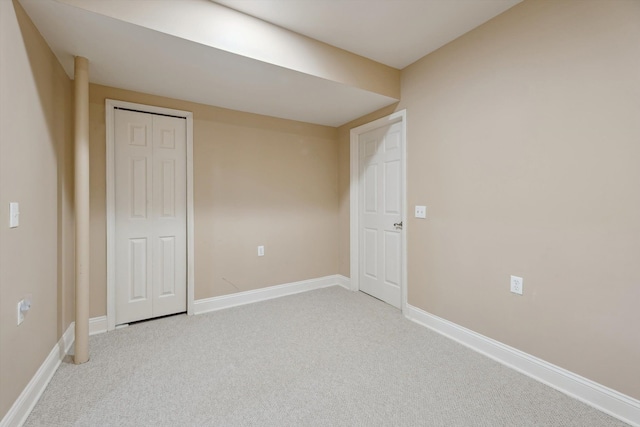 45055 Walnut Rdg, Northville, MI 48168 - spare room featuring light carpet and baseboards