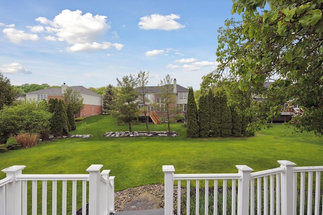 45055 Walnut Rdg, Northville, MI 48168 - view of green lawn with a playground and a residential view