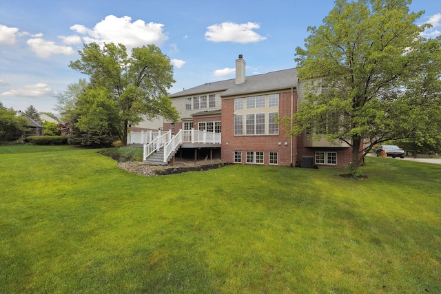 45055 Walnut Rdg, Northville, MI 48168 - rear view of house with a lawn, brick siding, central AC unit, and a chimney