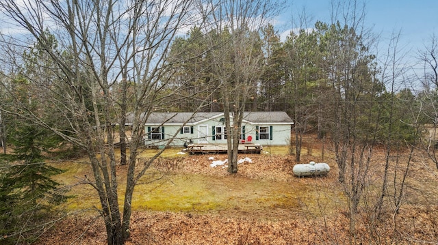 view of front of house with a wooden deck
