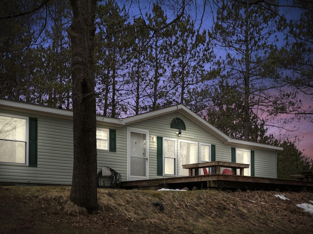 view of front of house featuring a deck