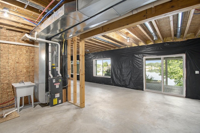below grade area featuring heating unit