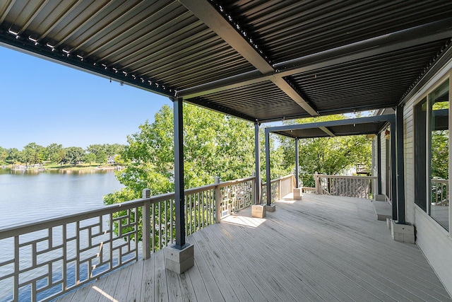 wooden terrace with a water view