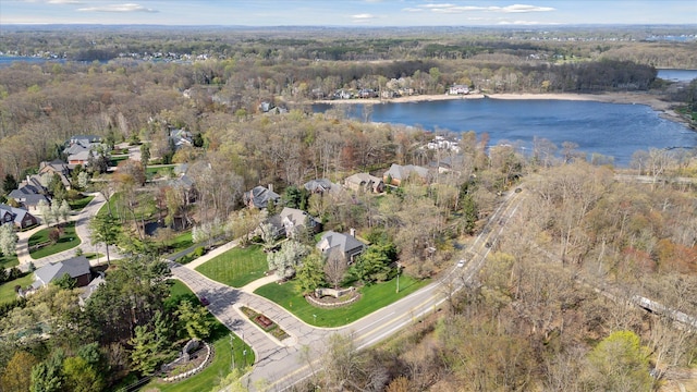 aerial view with a water view, a residential view, and a wooded view