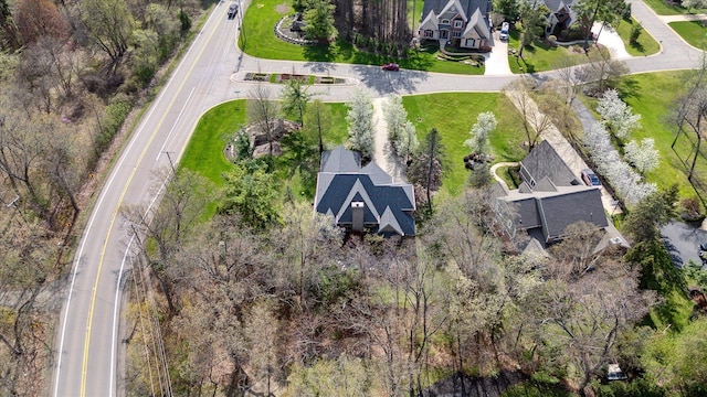birds eye view of property with a residential view