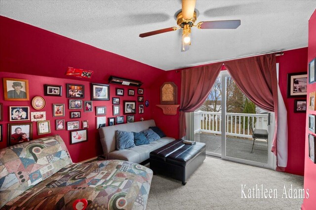 14319 Park Dr, Mecosta, MI 49332 - bedroom featuring access to outside, carpet, a textured ceiling, and ceiling fan