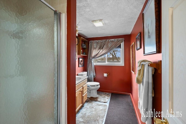 14319 Park Dr, Mecosta, MI 49332 - full bath featuring vanity, a shower stall, and a textured ceiling