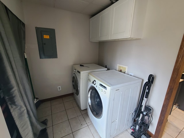 4161 Maple St, Brown City, MI 48416 - laundry area featuring electric panel, cabinet space, separate washer and dryer, light tile patterned flooring, and baseboards
