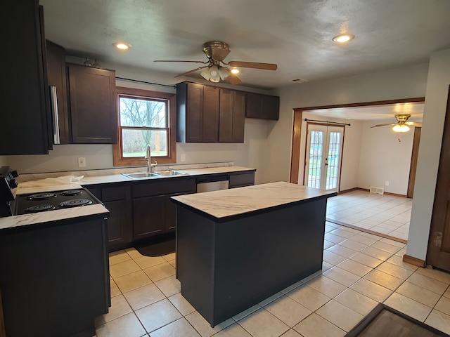 4161 Maple St, Brown City, MI 48416 - kitchen with a sink, a ceiling fan, french doors, range with electric stovetop, and recessed lighting