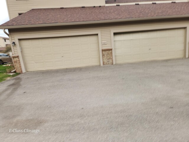 garage with driveway