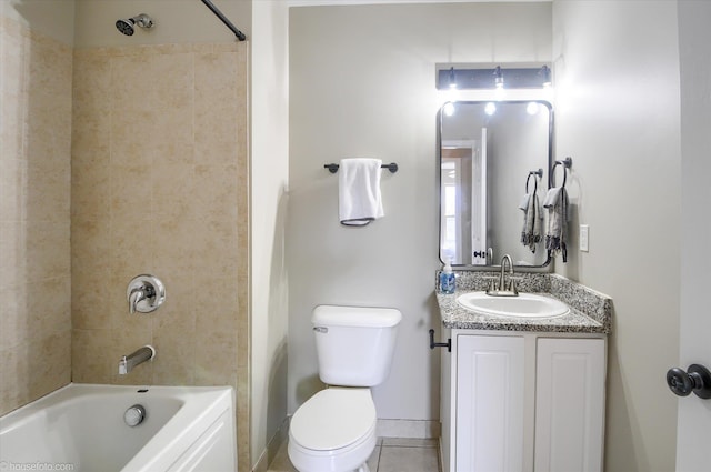 full bath with toilet, vanity, shower / bathing tub combination, tile patterned flooring, and baseboards