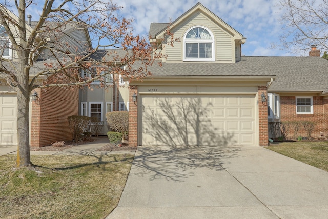 18735 Hilltop Blvd, Riverview, MI 48193 - view of front facade with brick siding, an attached garage, driveway, and roof with shingles