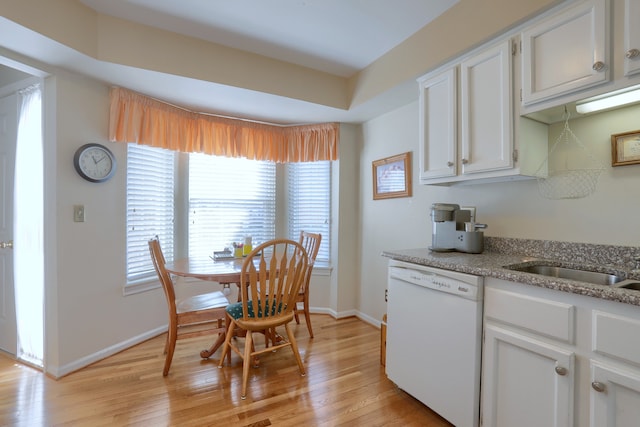 18735 Hilltop Blvd, Riverview, MI 48193 - kitchen featuring light wood-style flooring, baseboards, white cabinetry, and white dishwasher