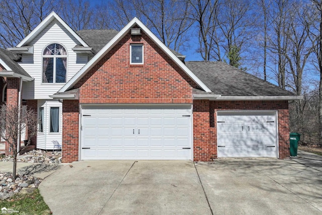 501 Dutch Mill Dr, Flushing, MI 48433 - traditional-style home featuring driveway, brick siding, and a garage