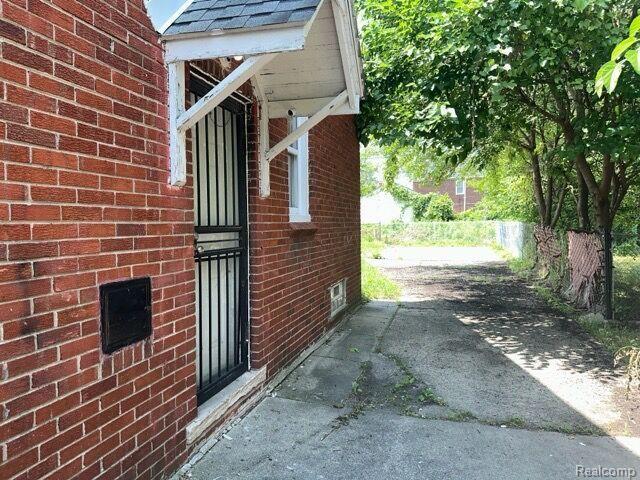 19533 Barlow St, Detroit, MI 48205 - view of home's exterior featuring brick siding