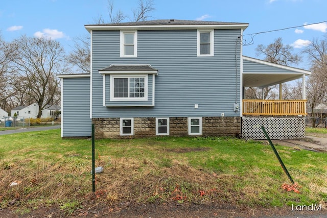 2206 Woodward Ave, Kalamazoo, MI 49007 - rear view of house with a lawn