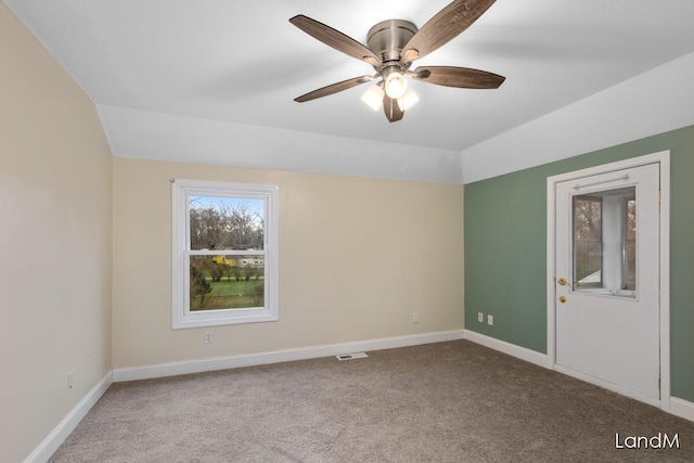 2206 Woodward Ave, Kalamazoo, MI 49007 - carpeted spare room featuring baseboards, visible vents, lofted ceiling, and ceiling fan