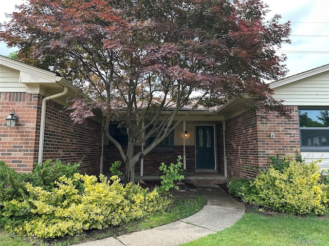 17018 White Haven Dr, Northville, MI 48168 - entrance to property featuring brick siding