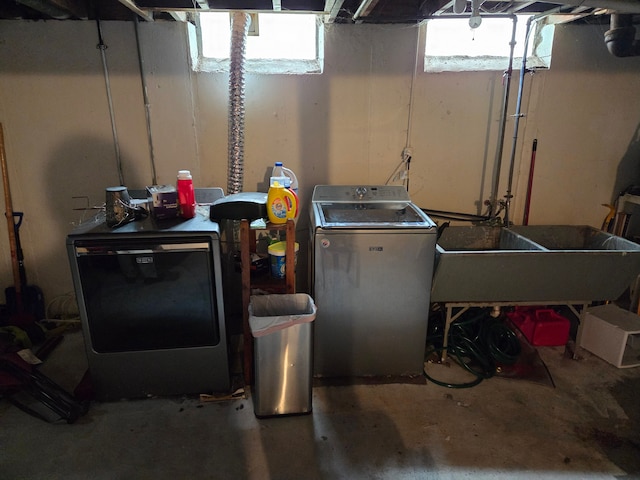 2046 Stieber St, Westland, MI 48186 - basement with washer and clothes dryer and a sink