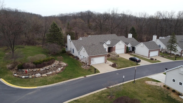 bird's eye view featuring a forest view