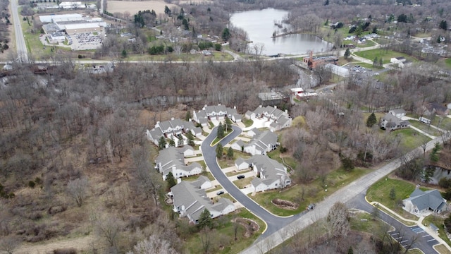 bird's eye view featuring a water view and a residential view