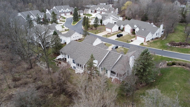 birds eye view of property with a residential view