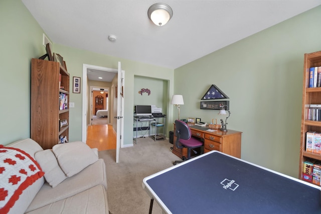 recreation room with carpet flooring