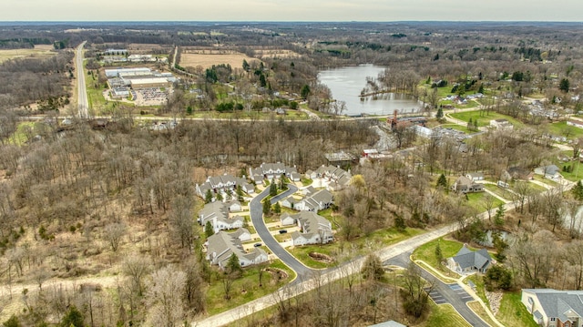 birds eye view of property featuring a residential view and a water view