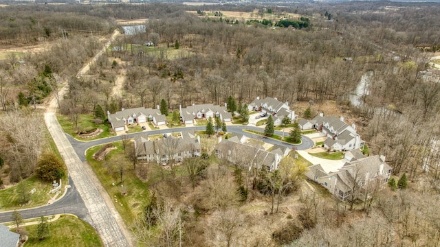 birds eye view of property with a residential view