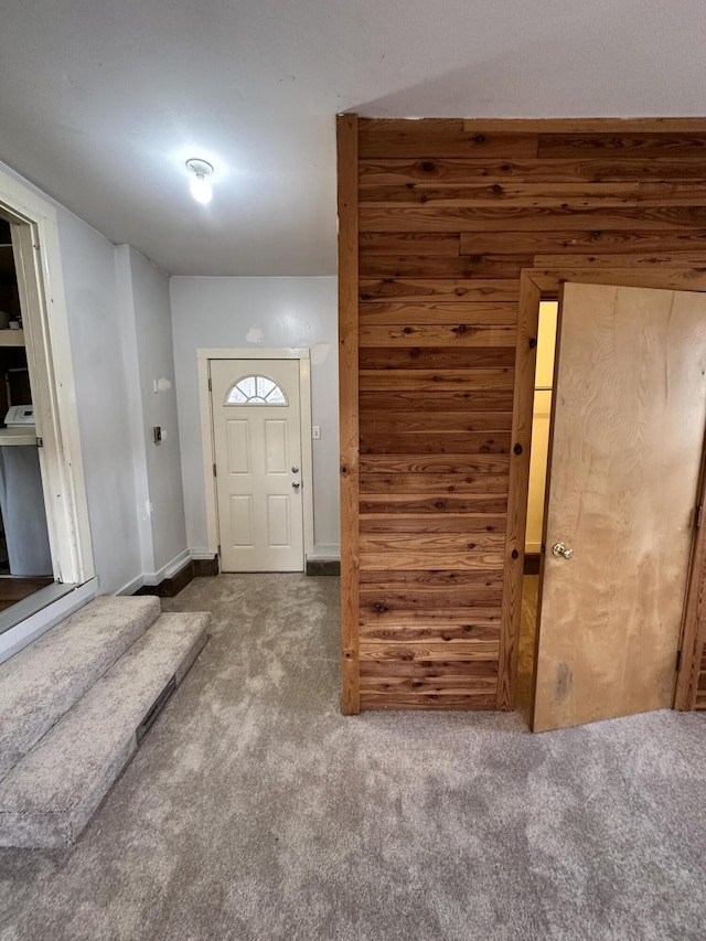 view of carpeted foyer