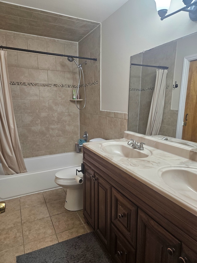 20709 Lockwood St, Taylor, MI 48180 - full bath with tile patterned floors, a sink, double vanity, tile walls, and shower / bathtub combination with curtain