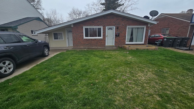 20709 Lockwood St, Taylor, MI 48180 - view of front of property with brick siding and a front lawn