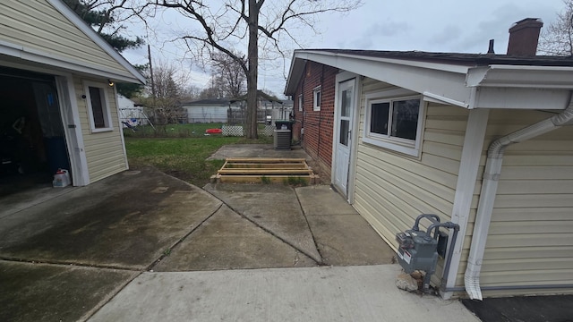 20709 Lockwood St, Taylor, MI 48180 - view of property exterior featuring a chimney and fence