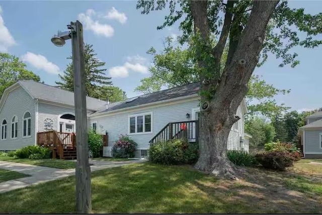 exterior space with a front yard