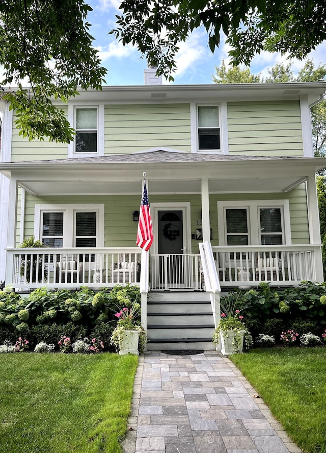 view of front of property featuring a porch