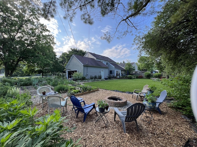 view of yard featuring a fire pit