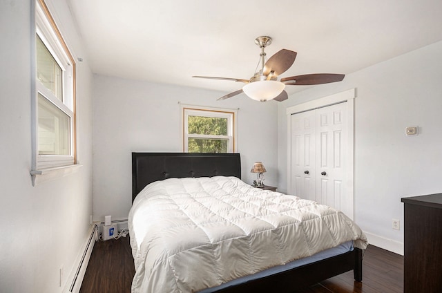 8100 Russell St, Shelby Twp, MI 48317 - bedroom with ceiling fan, dark wood finished floors, a closet, and a baseboard heating unit
