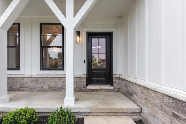50272 Hedgewood Dr, Canton, MI 48187 - doorway to property featuring board and batten siding