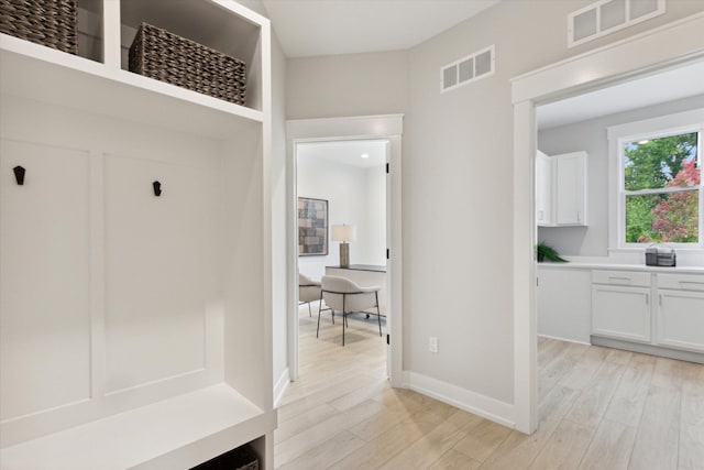 50272 Hedgewood Dr, Canton, MI 48187 - mudroom featuring baseboards, visible vents, and light wood-style floors