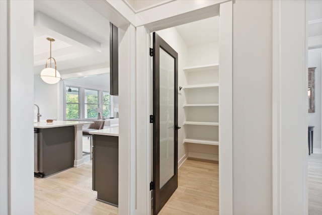 50272 Hedgewood Dr, Canton, MI 48187 - hall with beam ceiling and light wood finished floors