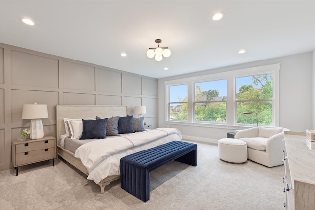 50272 Hedgewood Dr, Canton, MI 48187 - bedroom with light colored carpet, recessed lighting, a decorative wall, and a chandelier
