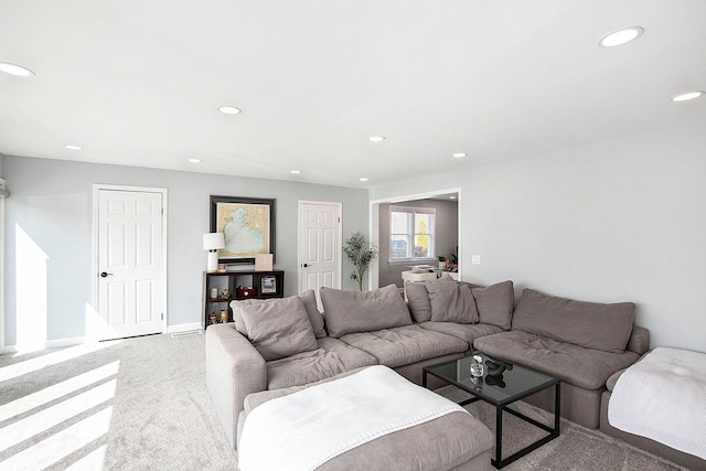 9861 Dixie, Ira, MI 48023 - living room featuring recessed lighting, light colored carpet, and baseboards